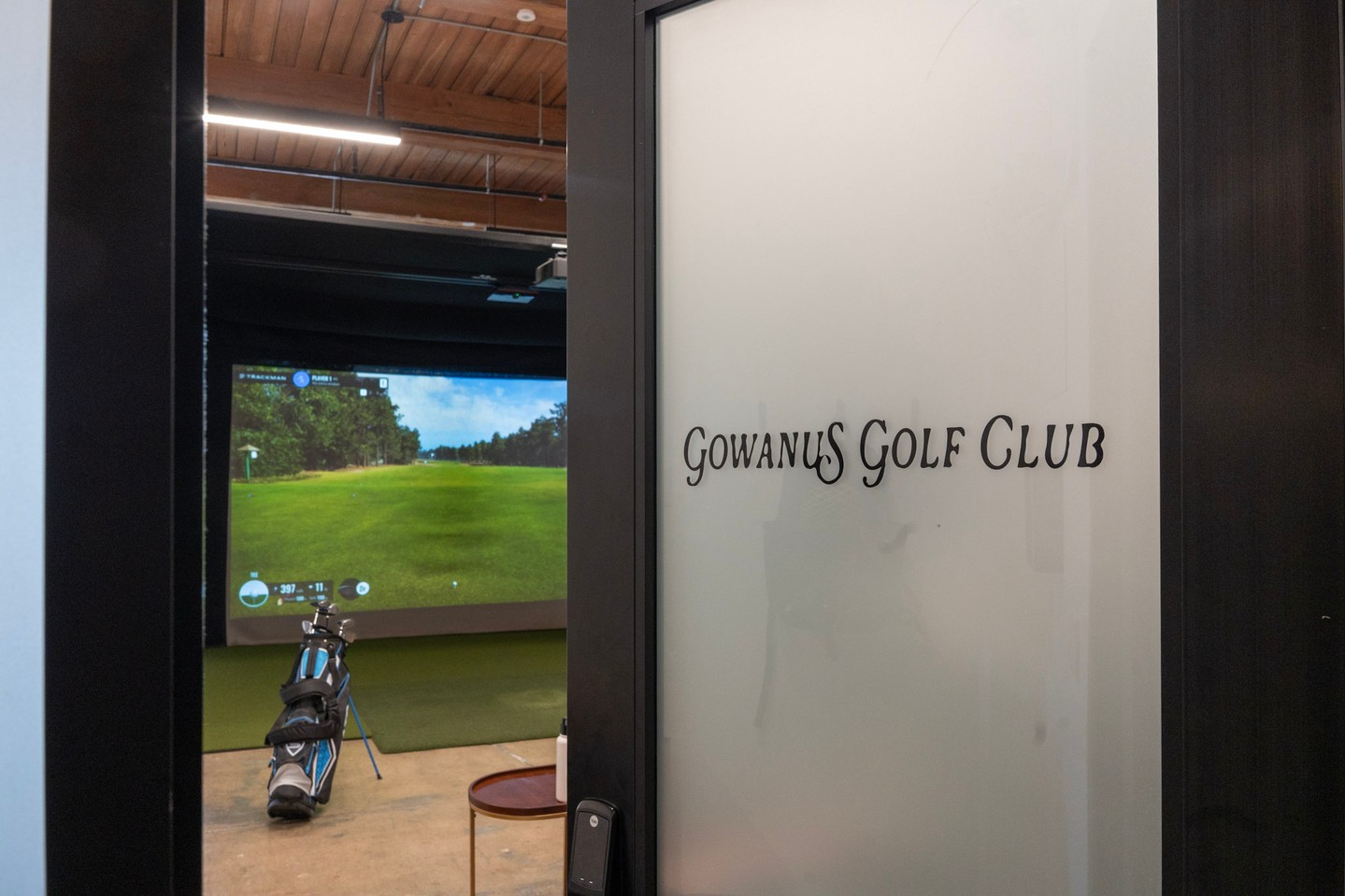 Gowanus Golf Club entrance with glass door